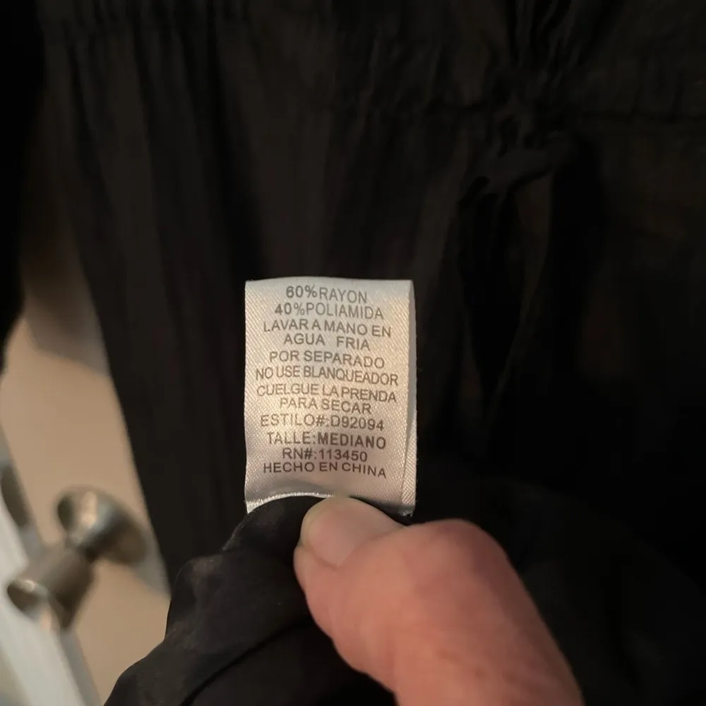 Lulumari drawstring empire waist dress with embroidered floral appliqués. - Image 10