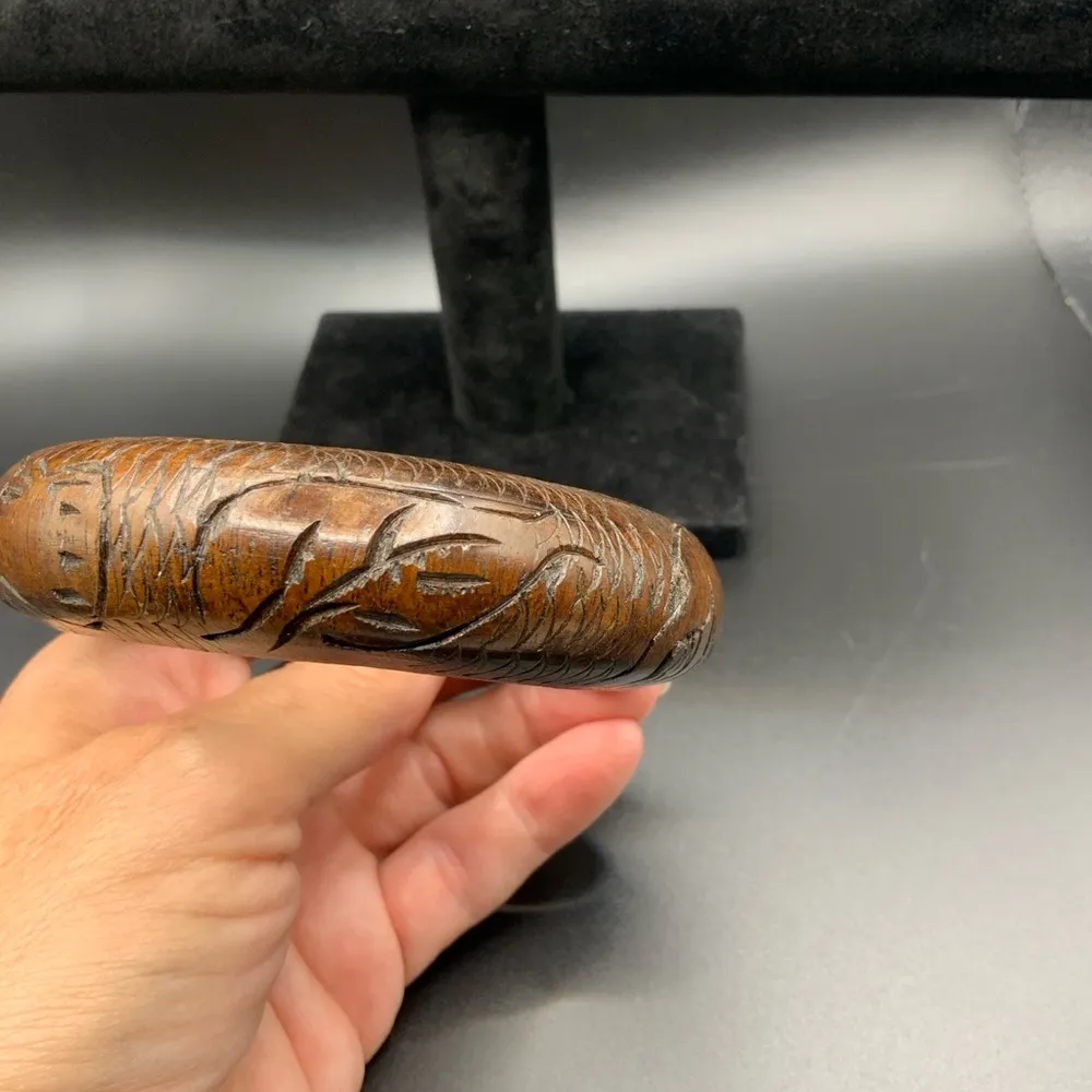 Wood carved bangle with images of rhinoceros and hippopotamus Brown - Image 6