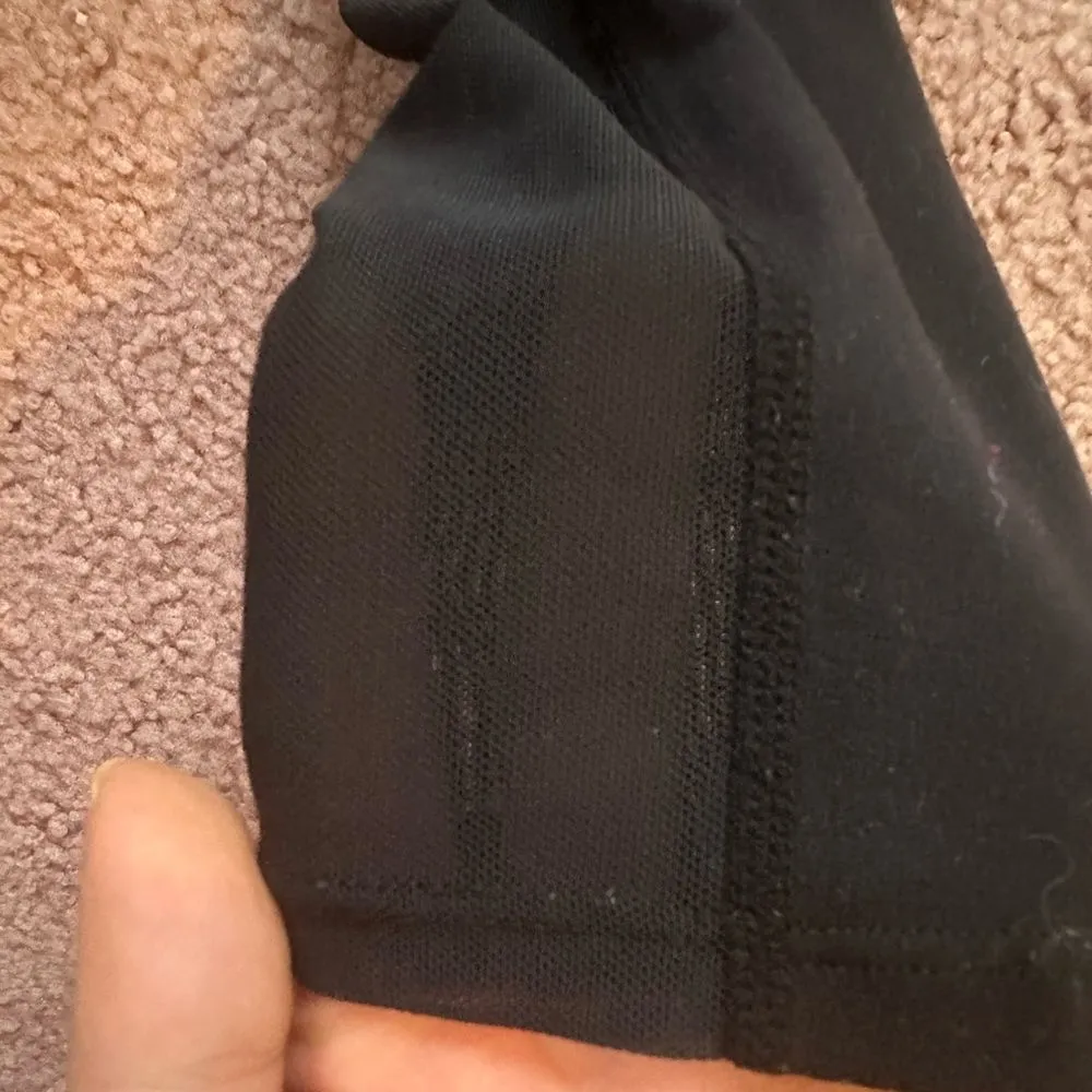 Gymshark Black Mesh Training Brandmark Leggings

Designed for versatility and performance, the Gymshark Black Mesh Training Brandmark Leggings will elevate your workout wardrobe. Featuring a sleek, high-waisted fit, these leggings provide both support and comfort, allowing for full freedom of movement. The breathable mesh panels promote airflow, ensuring you stay cool throughout your training sessions. Crafted from a soft, stretchy fabric blend, these leggings are perfect for any type of exercise, from high-intensity workouts to relaxed yoga sessions. With a timeless black hue and distinctive brandmark design, they seamlessly integrate into your active lifestyle. - Image 3