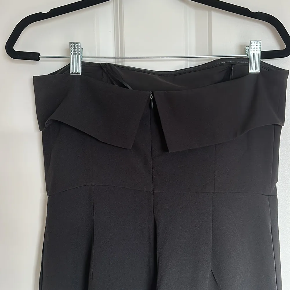 Adorable, sleeveless black jumpsuit, one leg with pocket size large - Image 4