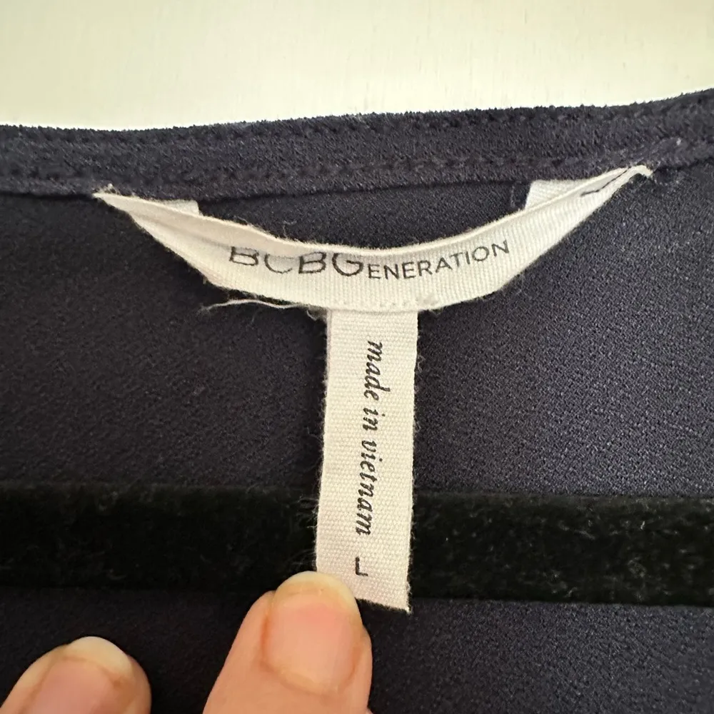 BCBGeneration Solid Navy Blue Sleeveless V-Neck Surplice Skort Romper - Image 3