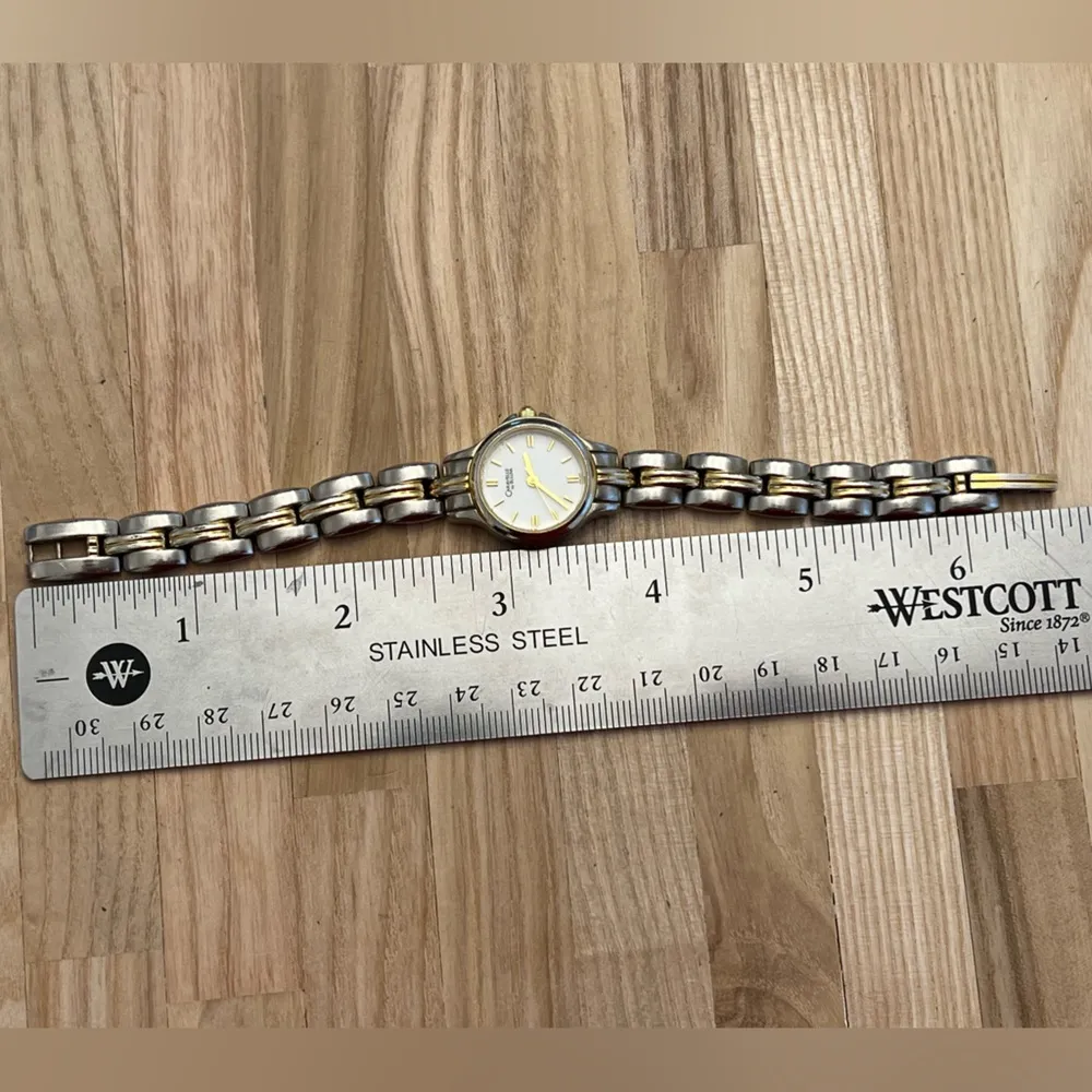 Caravelle by Bulova Ladies Watch Gold Silver Tone Bracelet White Dial Gold Hands - Image 11