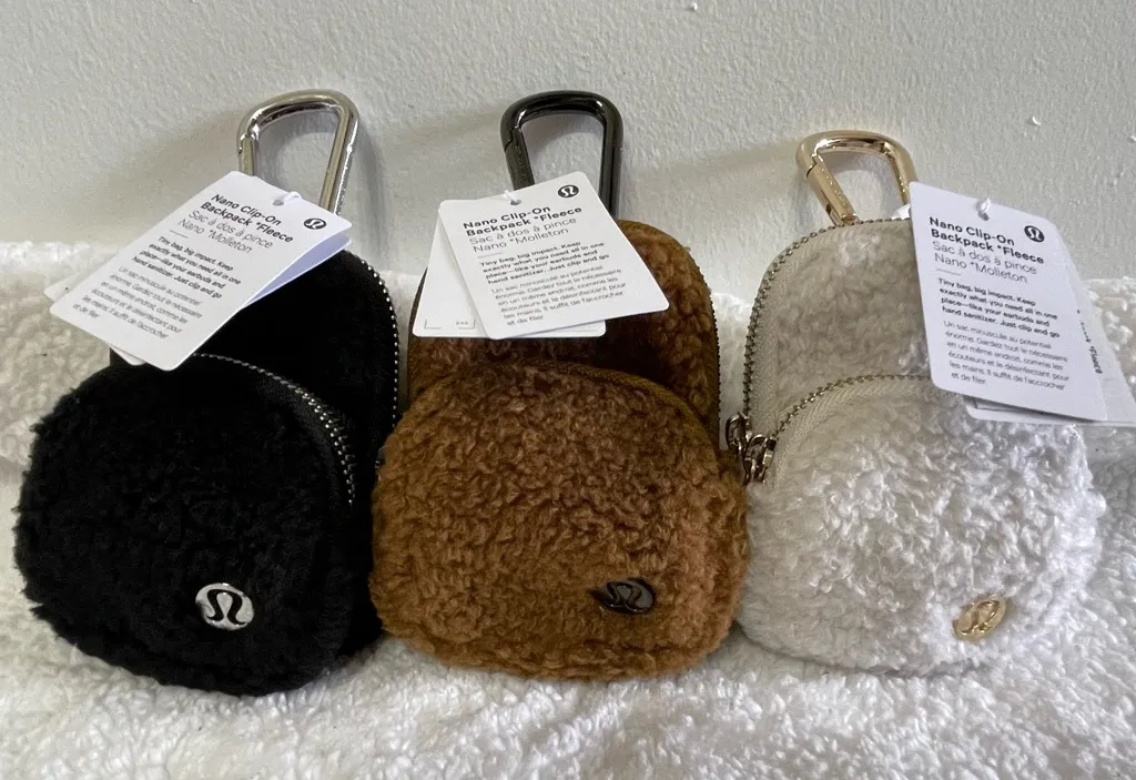 Lululemon Nano Clip-On Backpack Fleece in colors Light Ivory/Burnt Caramel. - Image 1