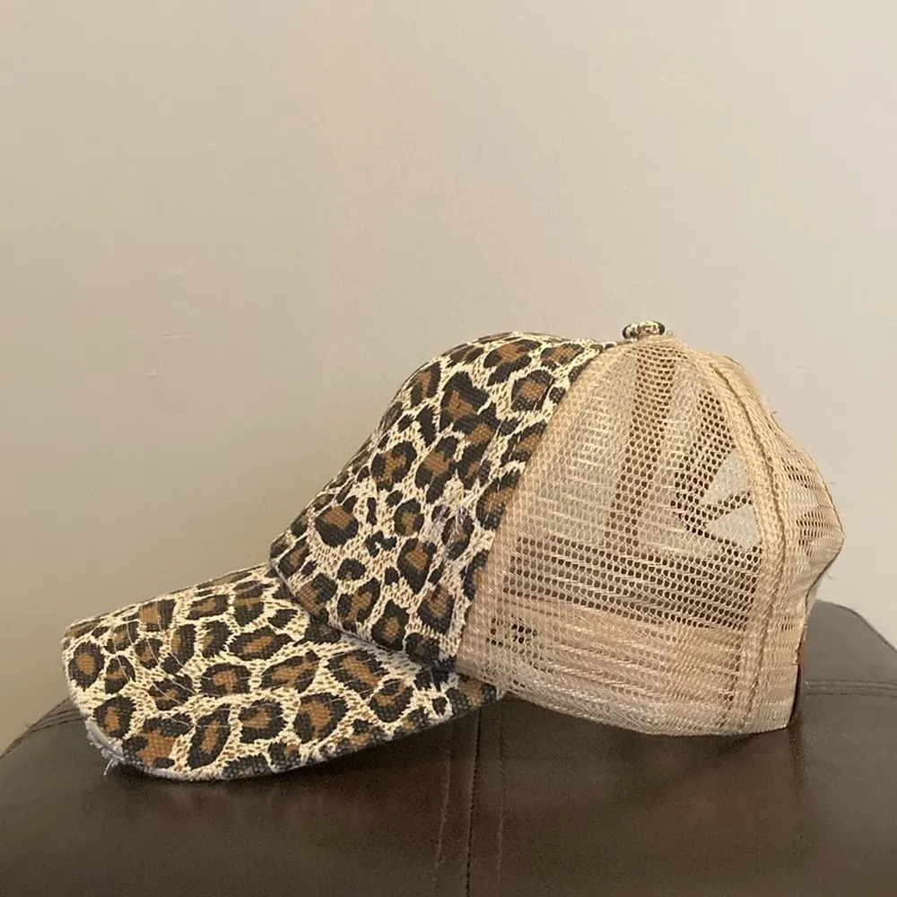 Charming Charlie’s Criss Cross Leopard Ponytail Trucker Hat - Image 3