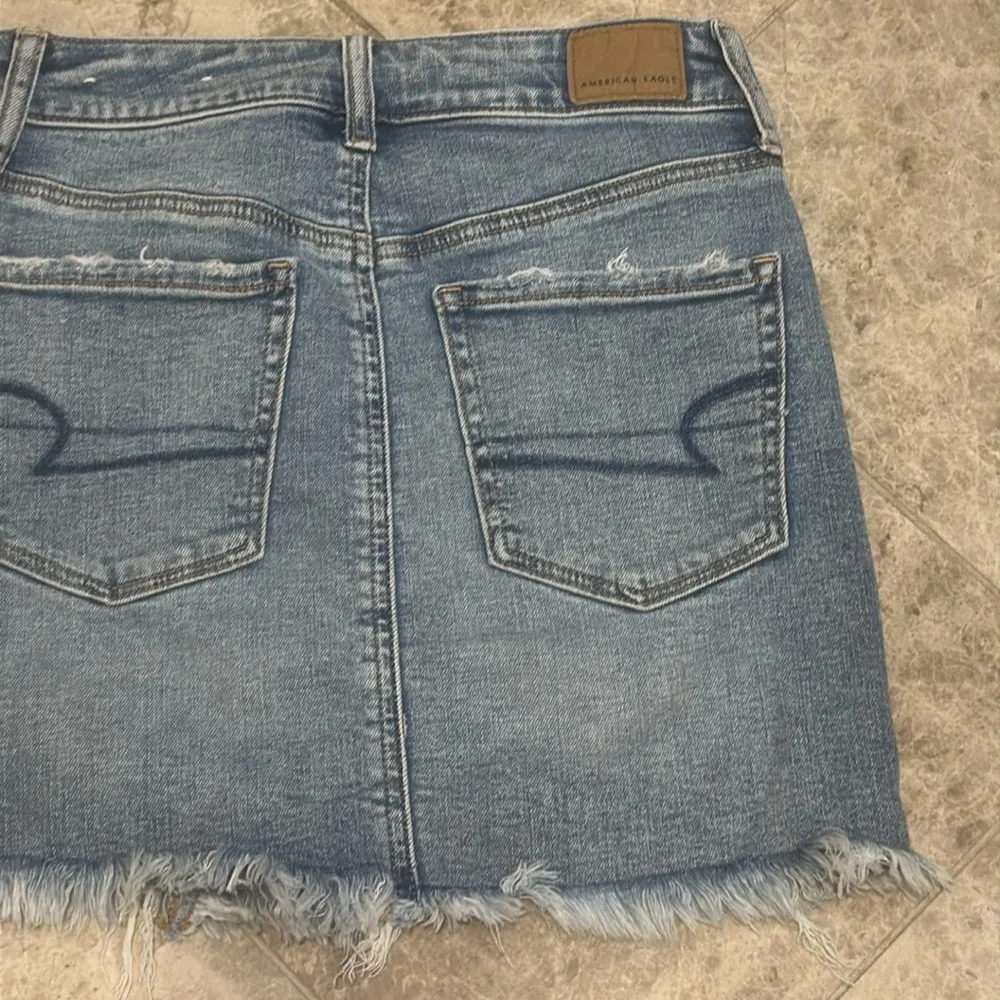 American Eagle Stretch High Waisted Perfect Denim Mini Skirt - Image 11