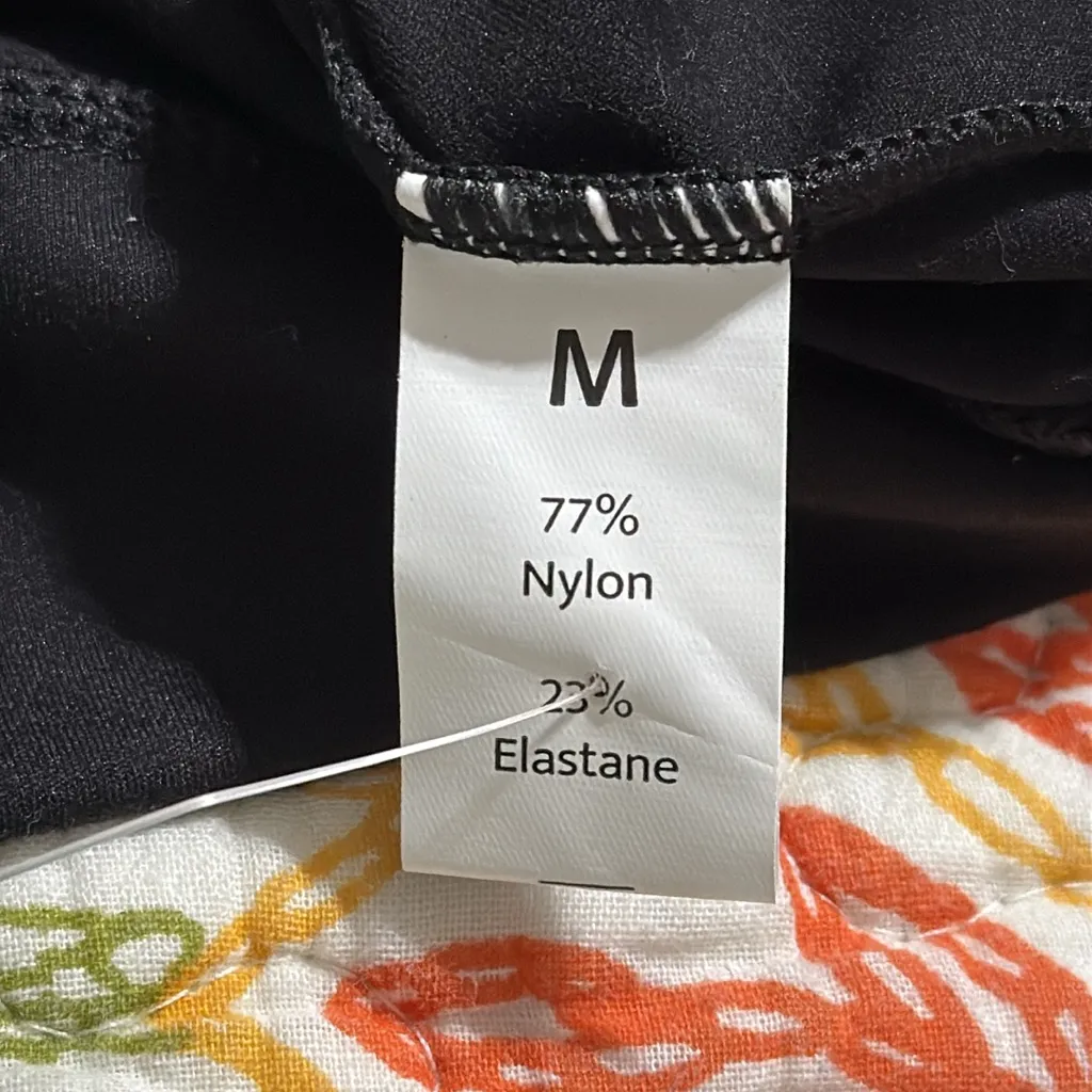 HALARA medium black cropped long sleeve thumb hole Crossover cropped yoga top - Image 9