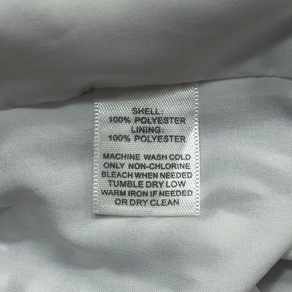 White House Black Market Black and White Aztec Tribal Print Pull On Mini Skirt - Image 4