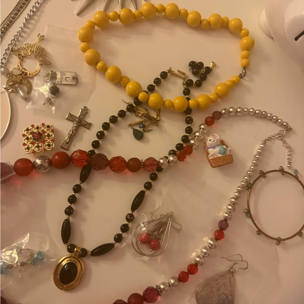 Bag of vintage jewelry with necklaces, charms, rings, earrings, and pins Yellow - Image 3