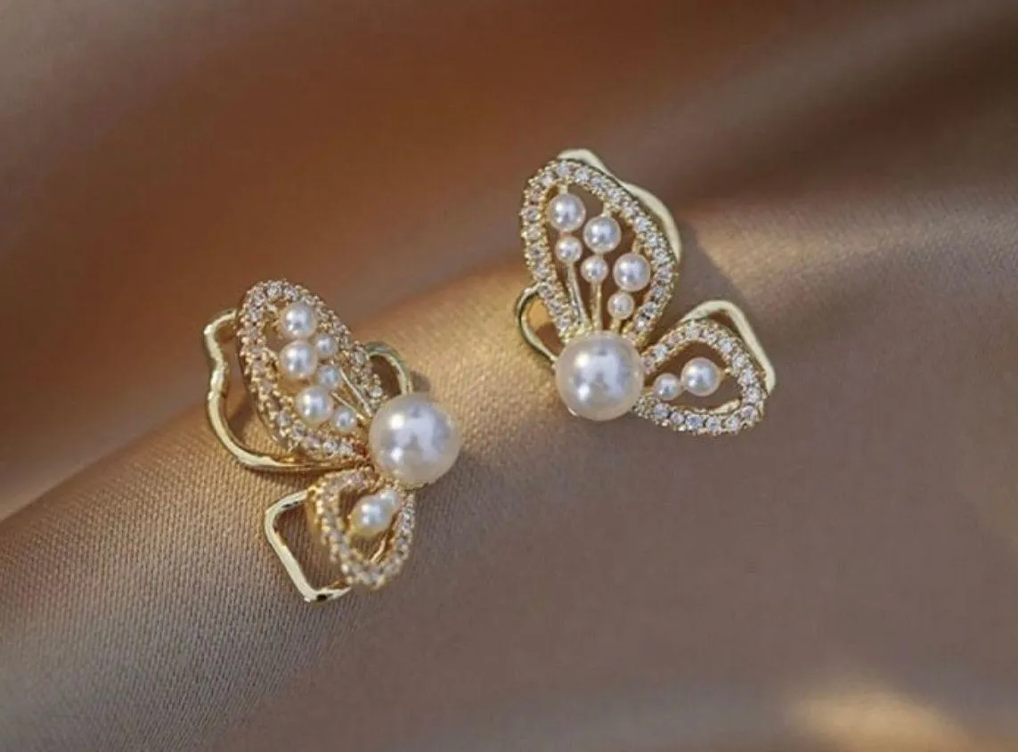 White pearl butterfly stud earrings for women Gold - Image 3