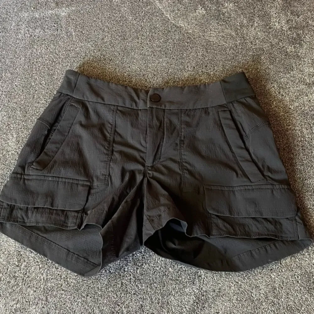 NWOT Athleta matte black shorts with‎ multiple zipper & button pockets - Image 2