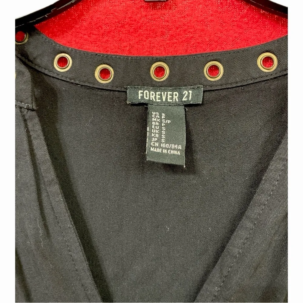 Forever 21 black dress with brass embellishments, pockets in the front size S - Image 3