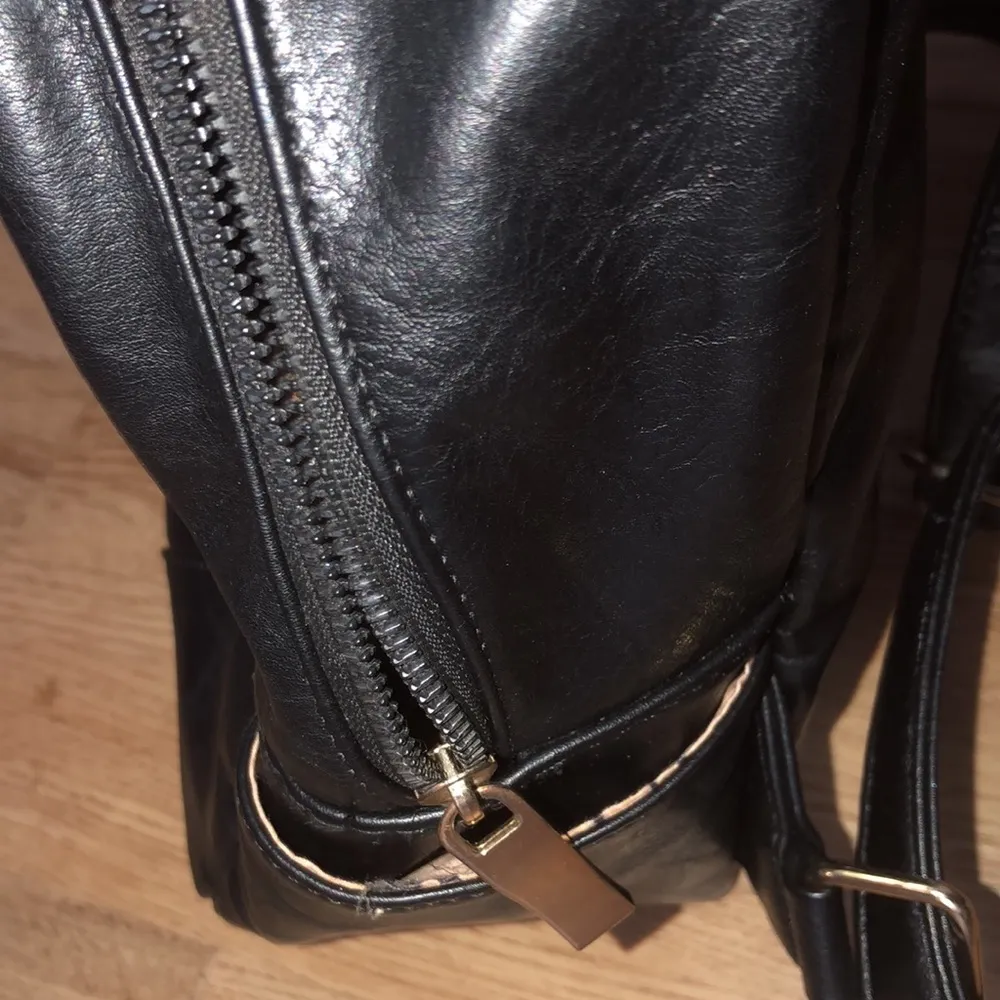 Faux leather black and gold backpack purse - Image 8