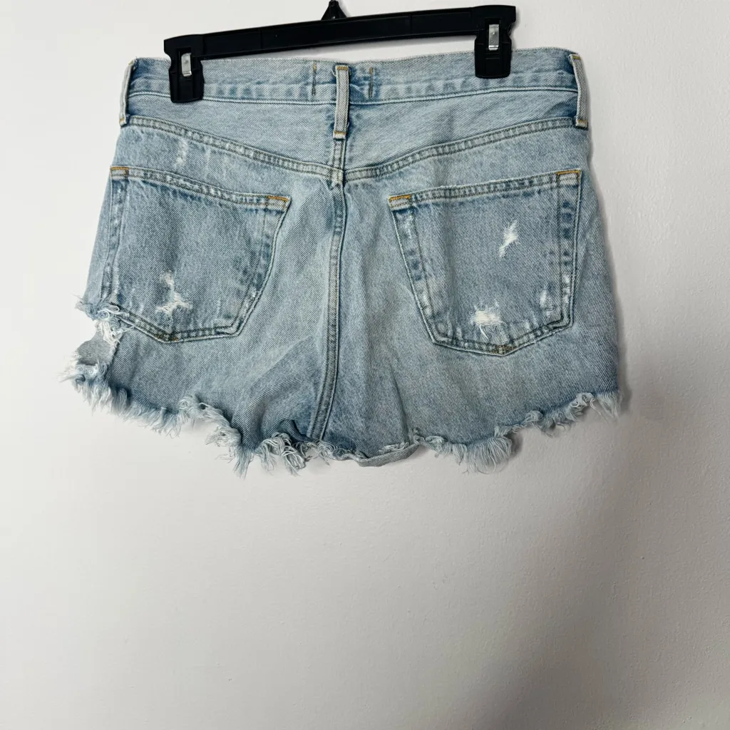 Agolde blue distressed Jean shorts size 27 - Image 4