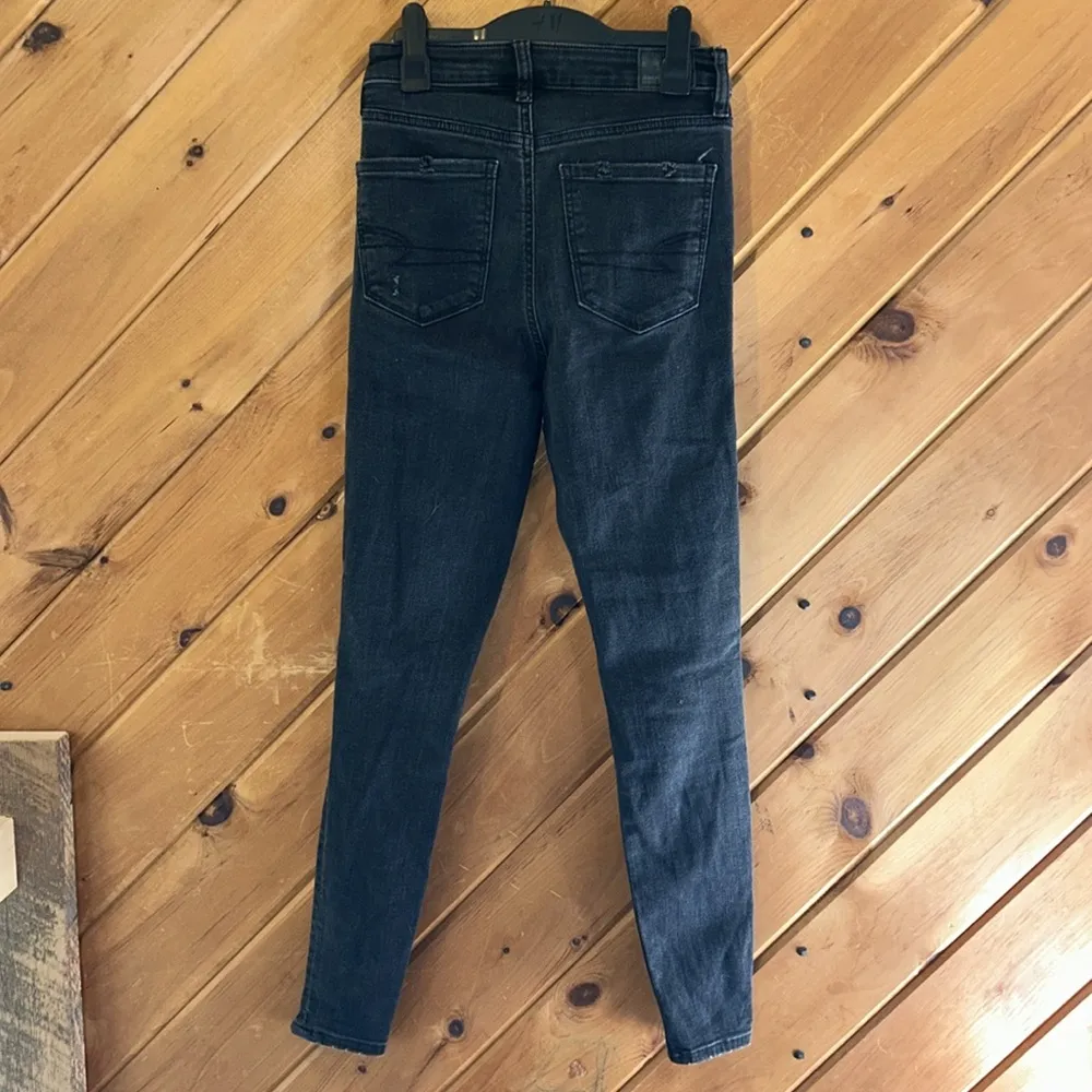 American Eagle super high-rise black jeggings distressed knee skinny jeans - Image 8