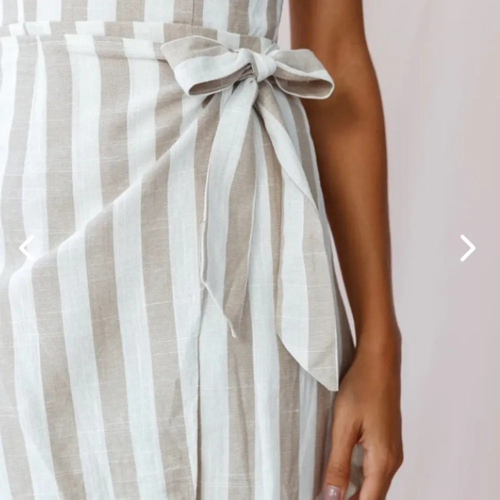 Saints + Secrets cotton wrap dress in beige white stripe with ruffle details. SM - Image 3