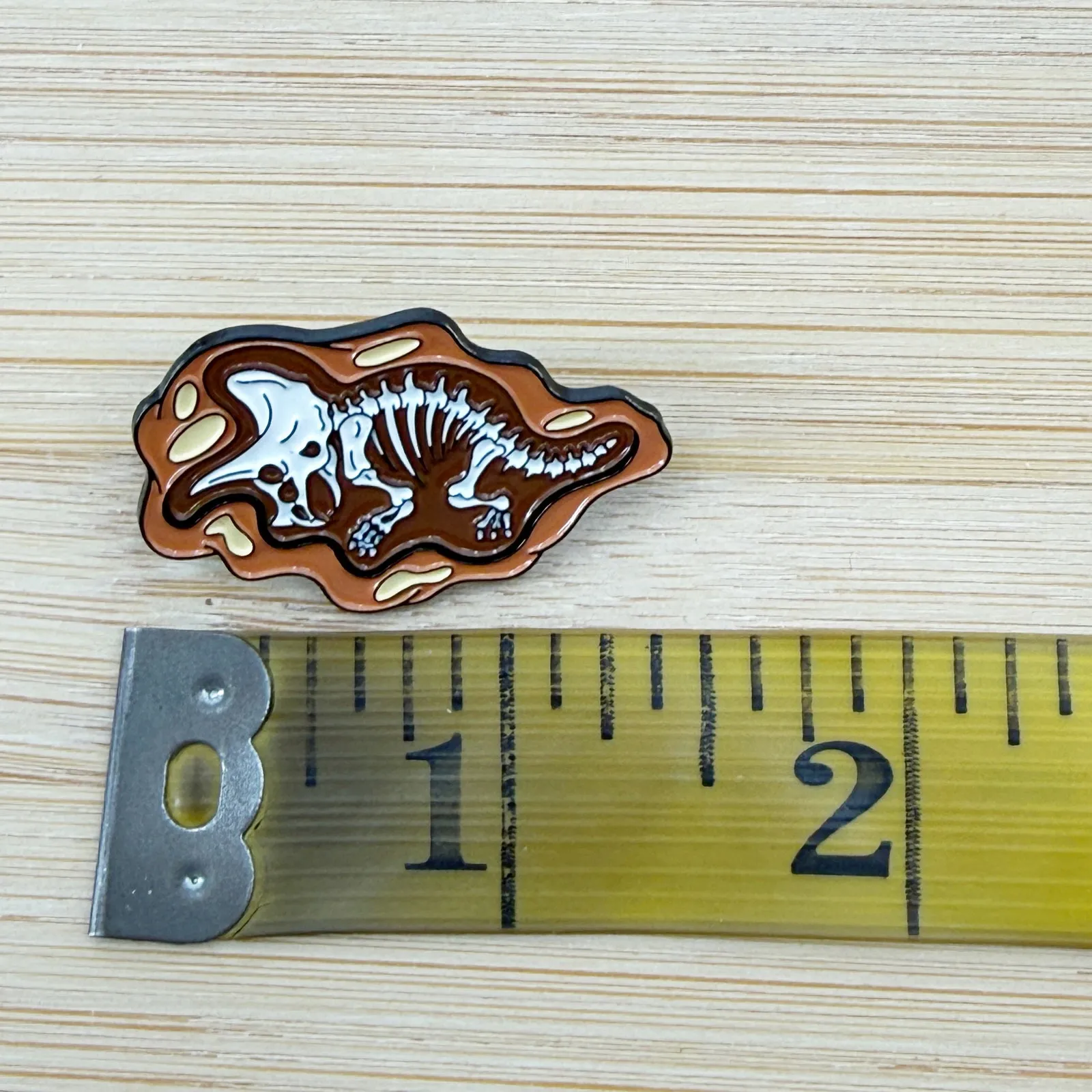 Triceratops Fossil Soft Enamel Pin Brown - Image 4