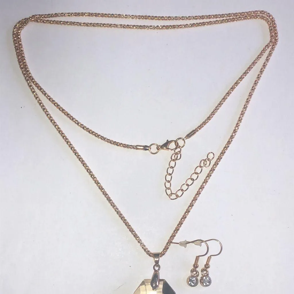 Elegant Gold Tone Faux Crystal Pendant Necklace and Earring Set - Image 3