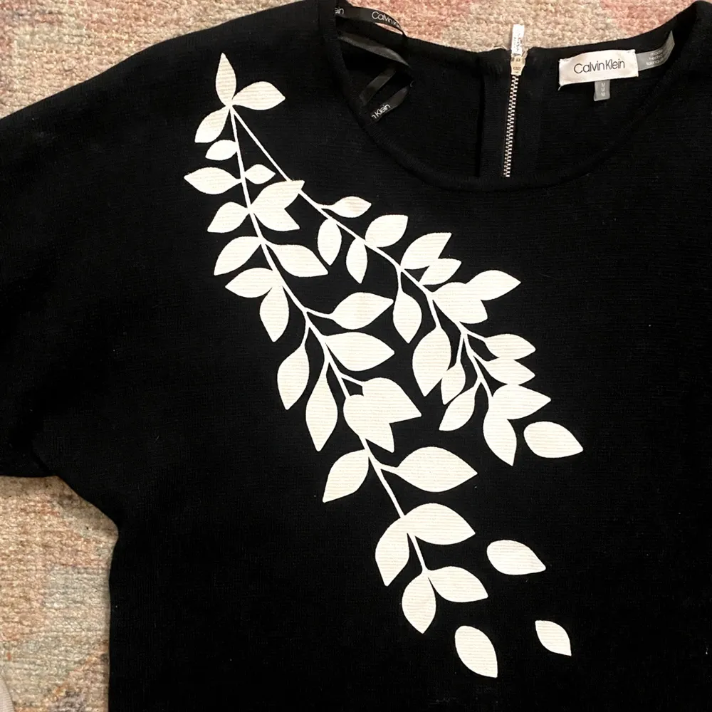 Calvin Klein Short Sleeve Black Zip Back Sweater with Leaf Print - Image 5