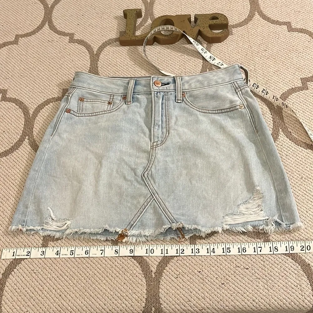 American Eagle Outfitters distressed light wash mini denim skirt - Image 16