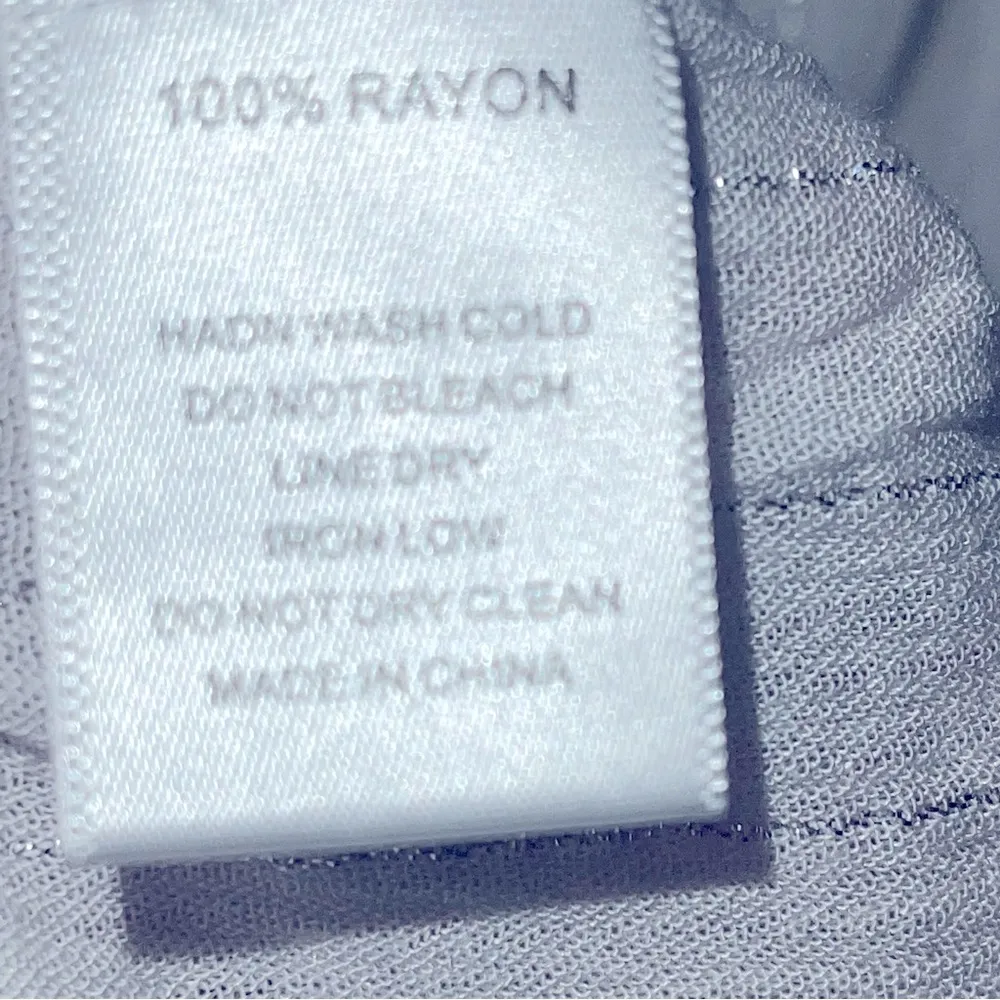 Long sleeve blouse NWOT white with silver detailed geometry neckline - Image 8