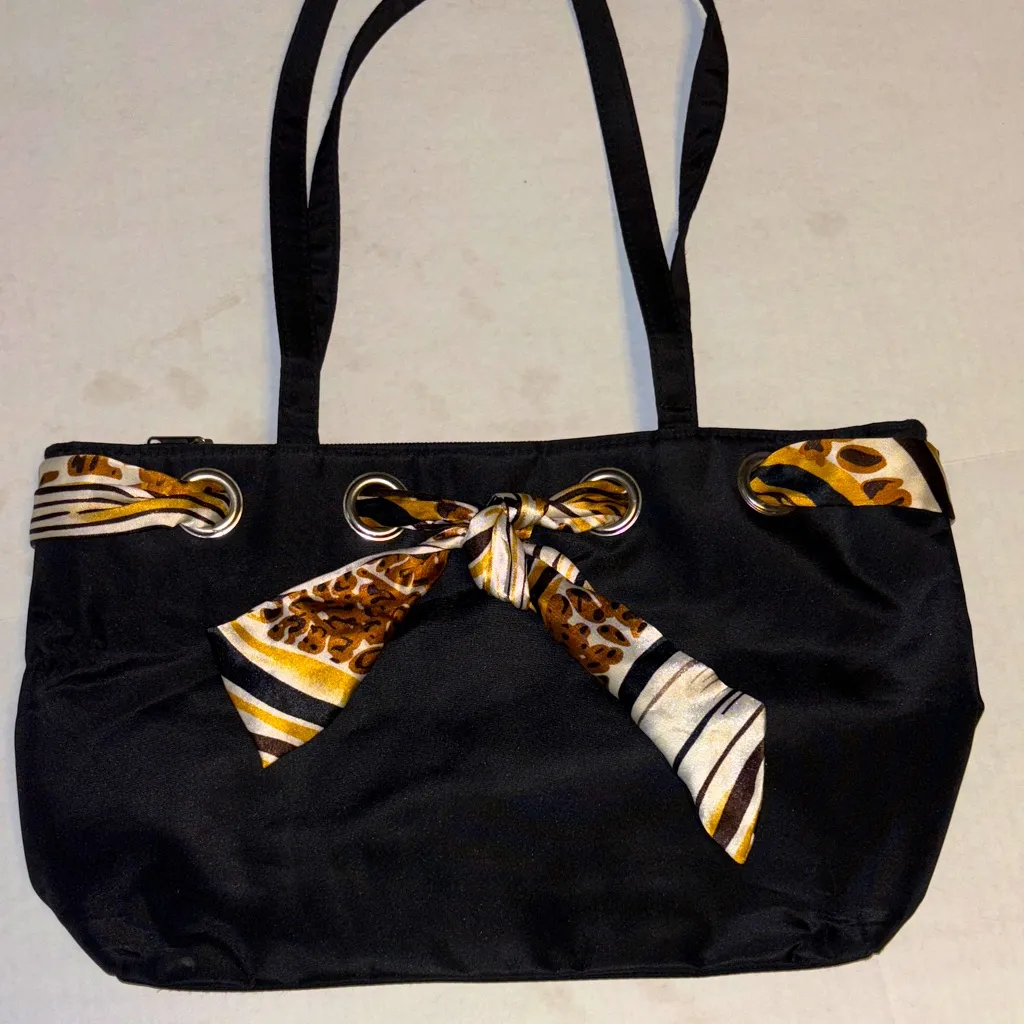 BLACK NYLON TOTE/SHOULDER BAG TIE INTERWOVEN THRU BAG
3 COMPARTMENTS ONE ZIPPER - Image 1