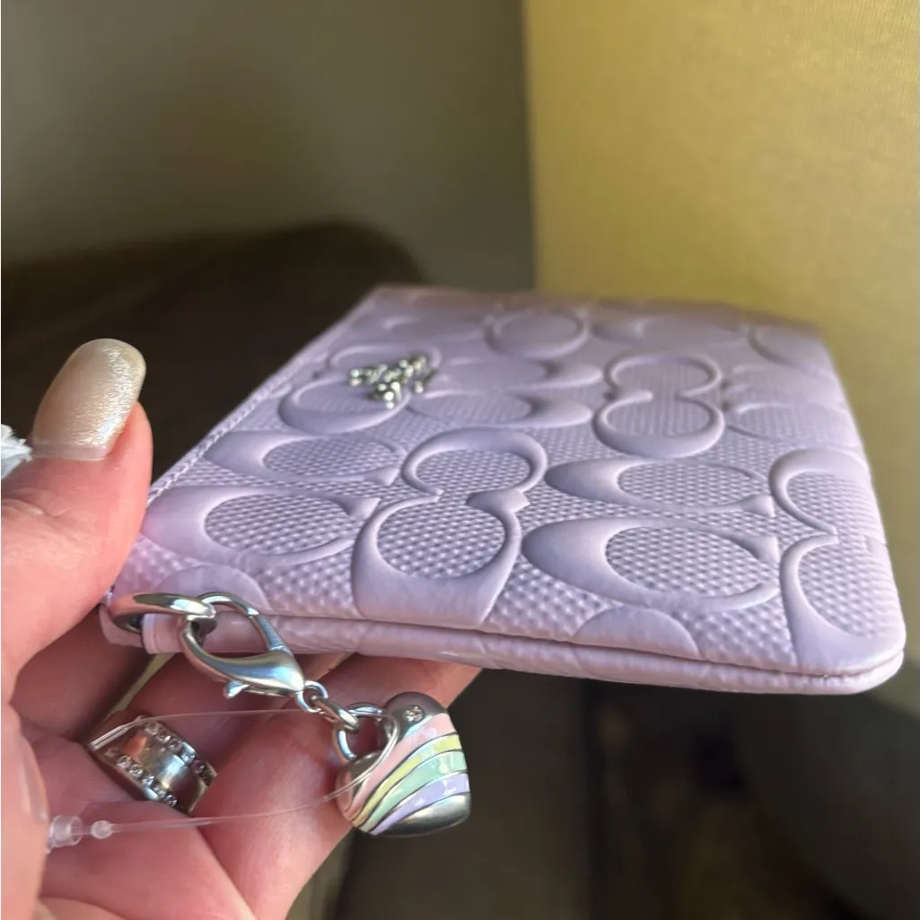 Authentic COACH patent signature leather zip top wristlet with a heart charm - Image 5