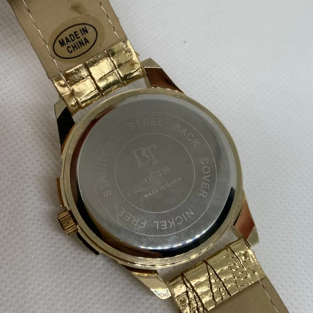 BT women’s gold tone watch quartz 42mm round case analog leather running - Image 6