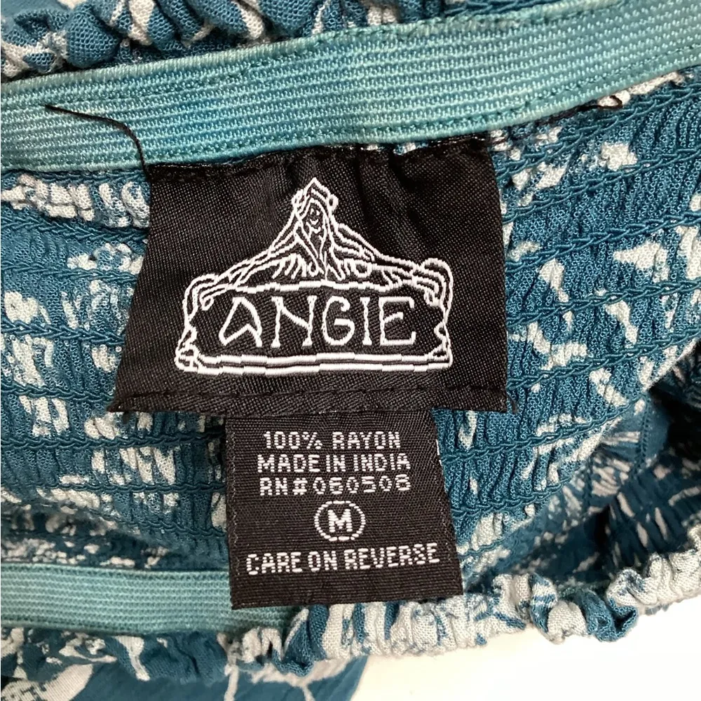 Angie Teal and White Smocked Bodice Angled
Hem Jumpsuit (Q5V65) - Image 4