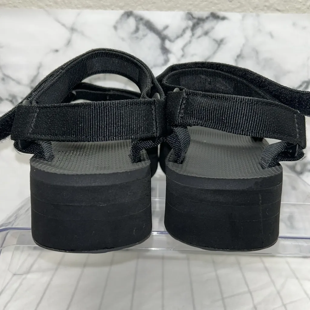 Teva Black Sandals with Gold Logo Flatform Universal Sandal - Image 4