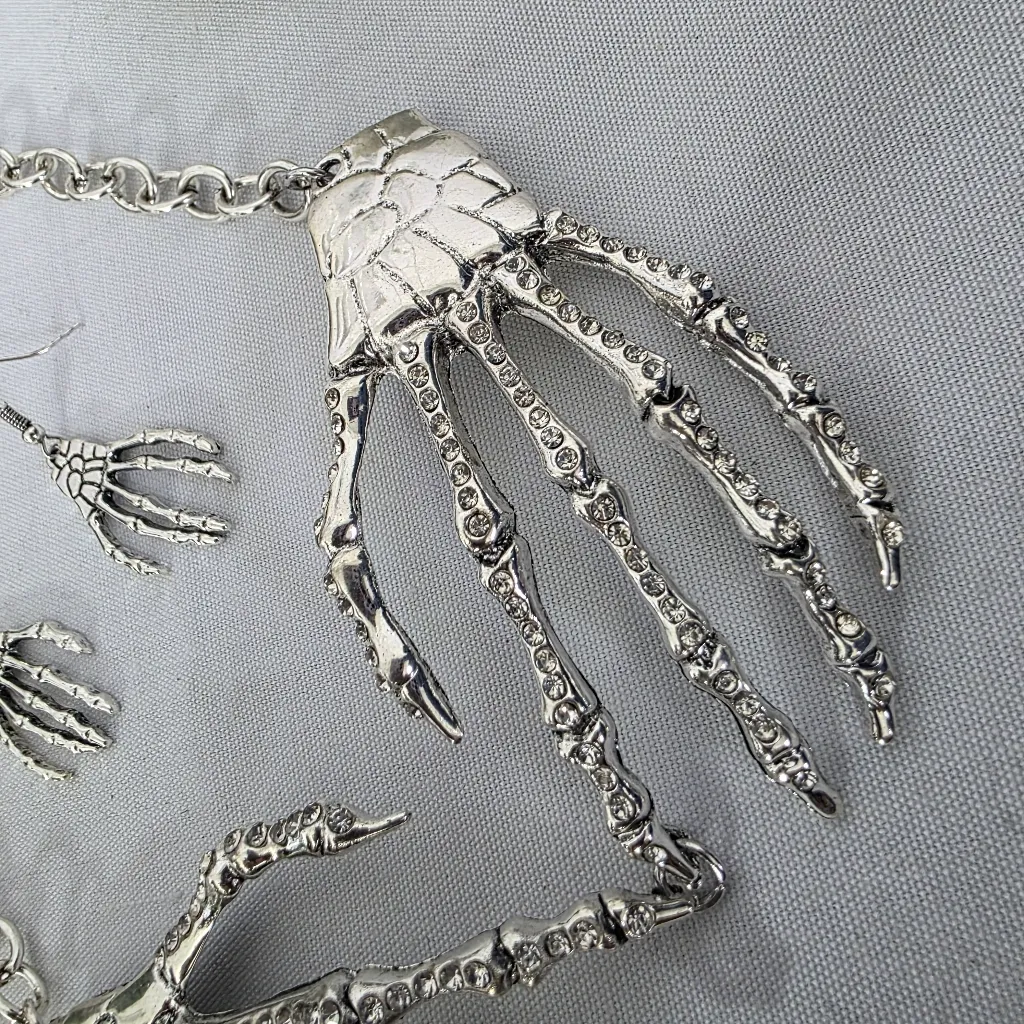 Silver Statement  Skeleton Hands Necklace And Earrings Set - Image 4