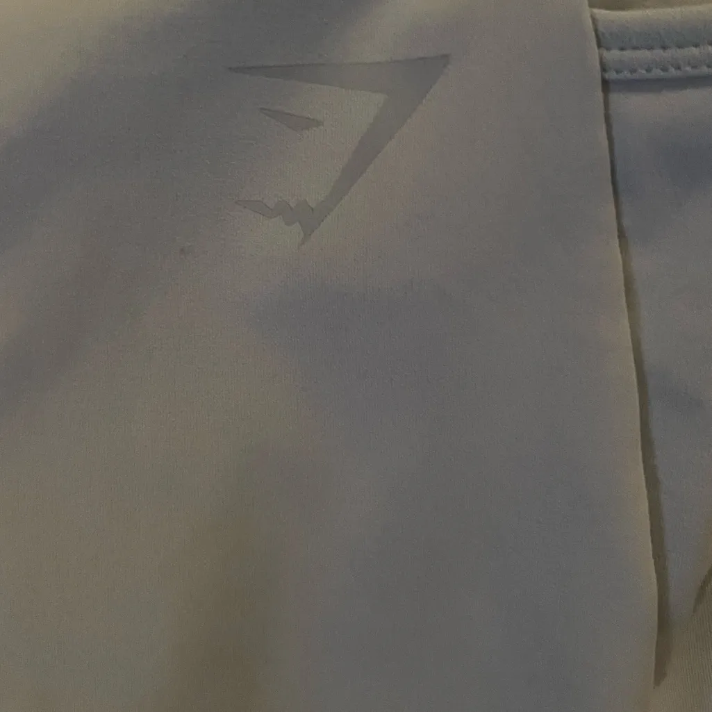 Gymshark x Nikki Blackketter Dynamic Leggings in a light blue and white colorway - Image 4