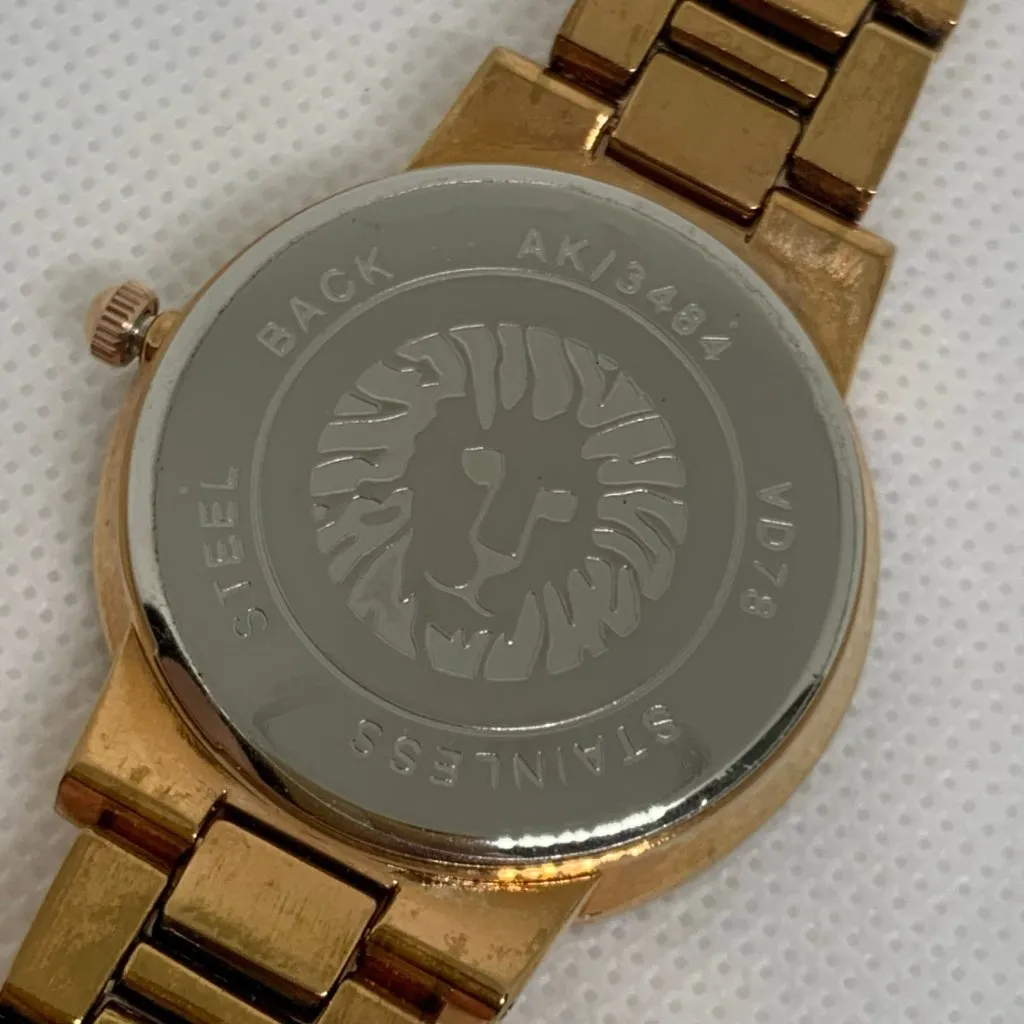 Anne Klein women watch rose gold tone small second 35mm round quartz running - Image 6