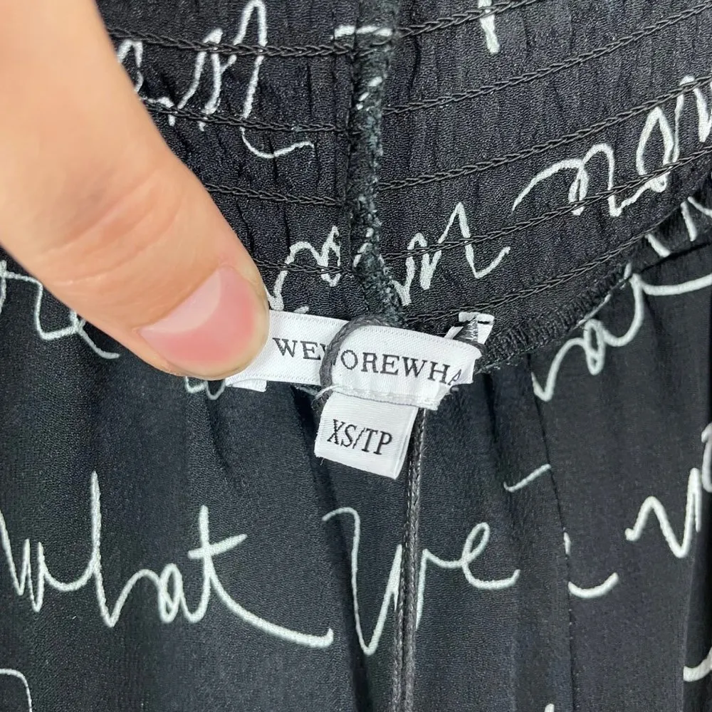 NWT‎ We Wore What Woman's Sz XS Black Sheer Flared Leg Logo Print Smocked Pants - Image 8