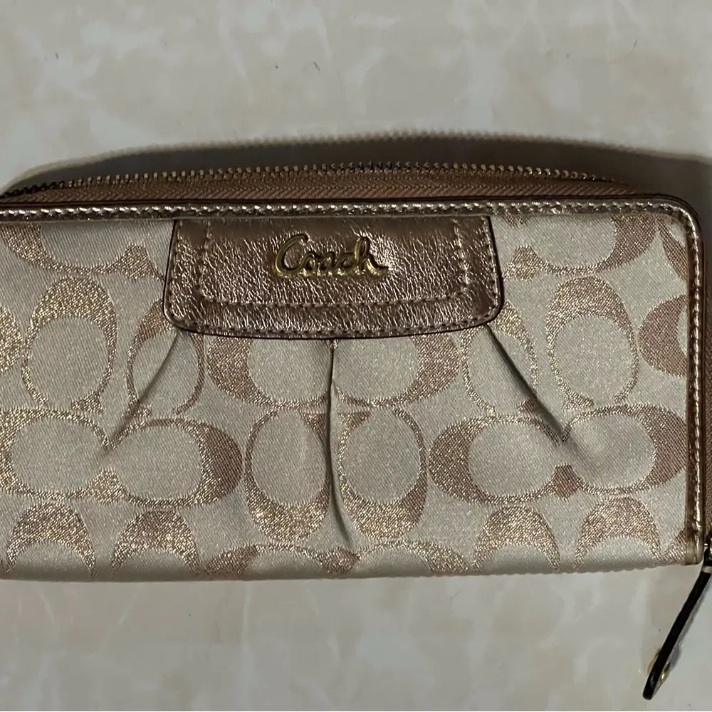 COACH signature Charlie C zip around wallet gold with purple interior - Image 8