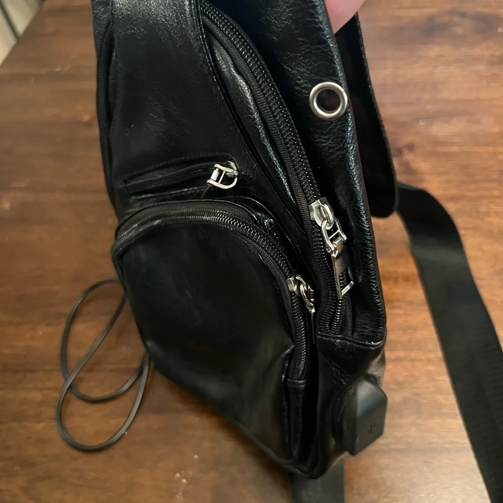 Black pleather side sling bag with USB connector - Image 2