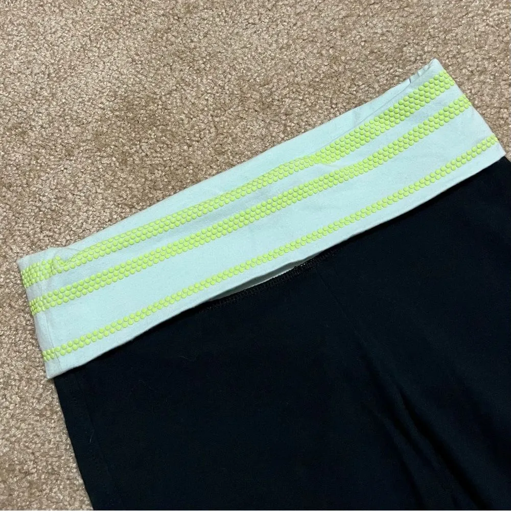 cropped black yoga leggings with neon foldover waistband, size small - Image 2