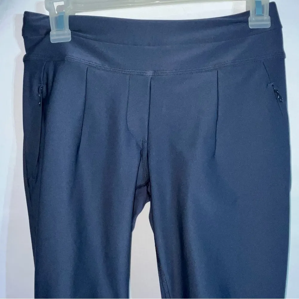 Lululemon athleta women’s size 4 pants with back calf zippers, zipper pockets. - Image 3