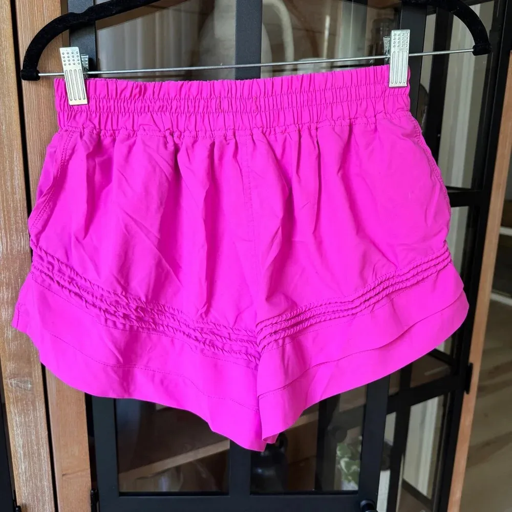 FP Movement Check It Out shorts neon barbie pink workout running pockets - Image 2