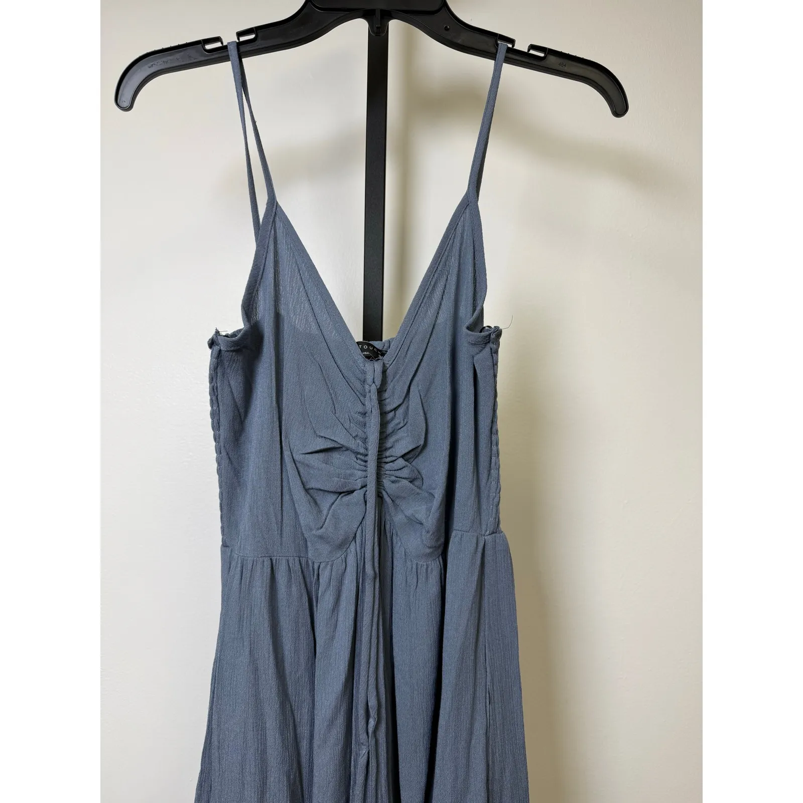 WOVEN SOLID FRONT RUCHED ROUND HEMMING MIDI JUMPSUIT.
100% RAYON GAUZE - Image 3