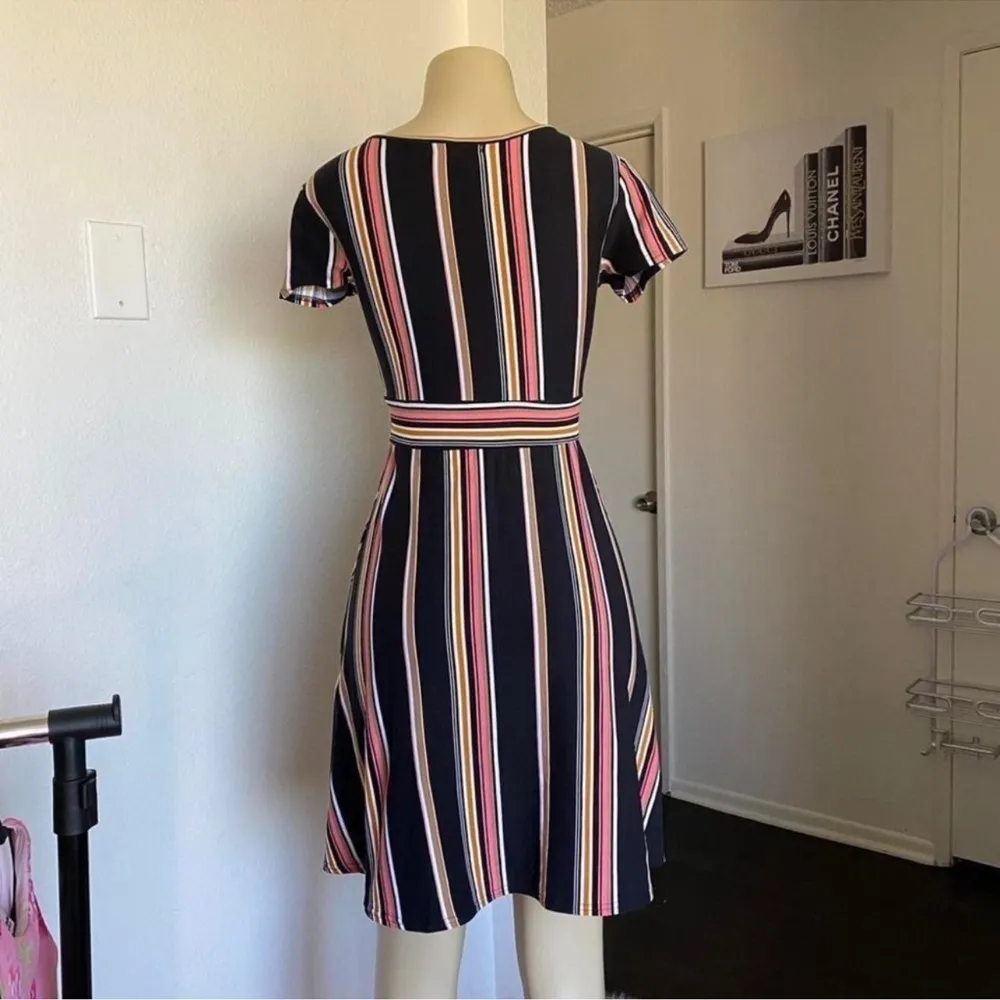 Cute black, pink, and yellow striped faux wrap dress. Black - Image 5