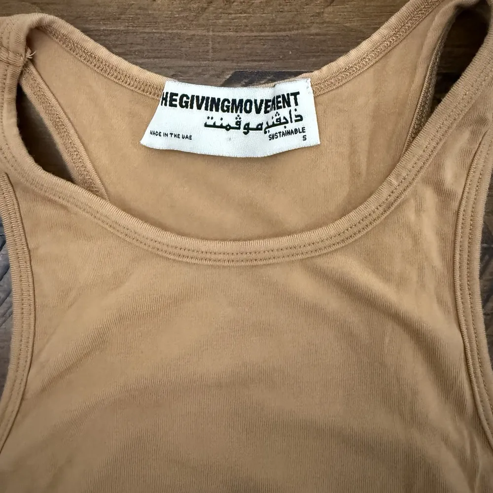 The Giving Movement Tan Tank Racerback Size Small Crop - Image 5