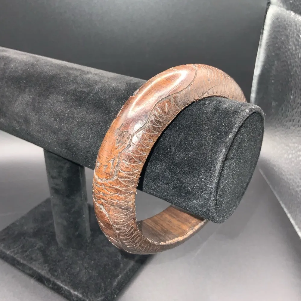 Wood carved bangle with images of rhinoceros and hippopotamus Brown - Image 3