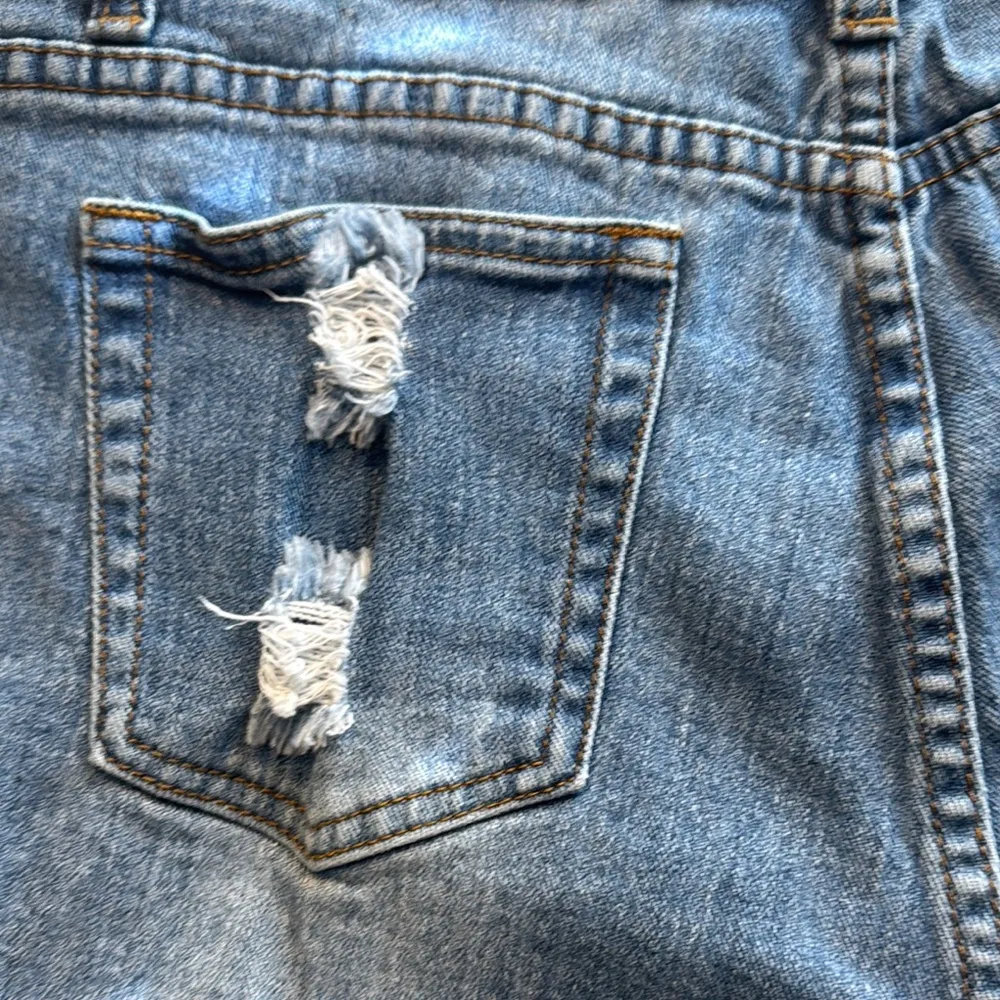 High Rise Distressed Blue Jean Button Fly Shorts with Raw Cut - Image 7