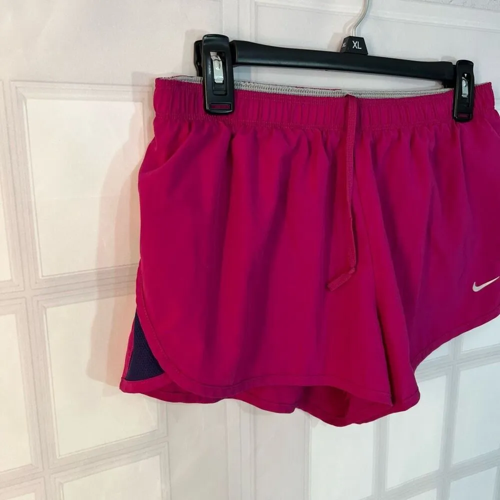 Nike dri-fit magenta lined running shorts size medium - Image 2