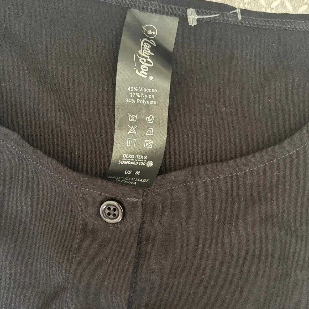 Black Sleeveless Ruffle Hem Top - Image 3