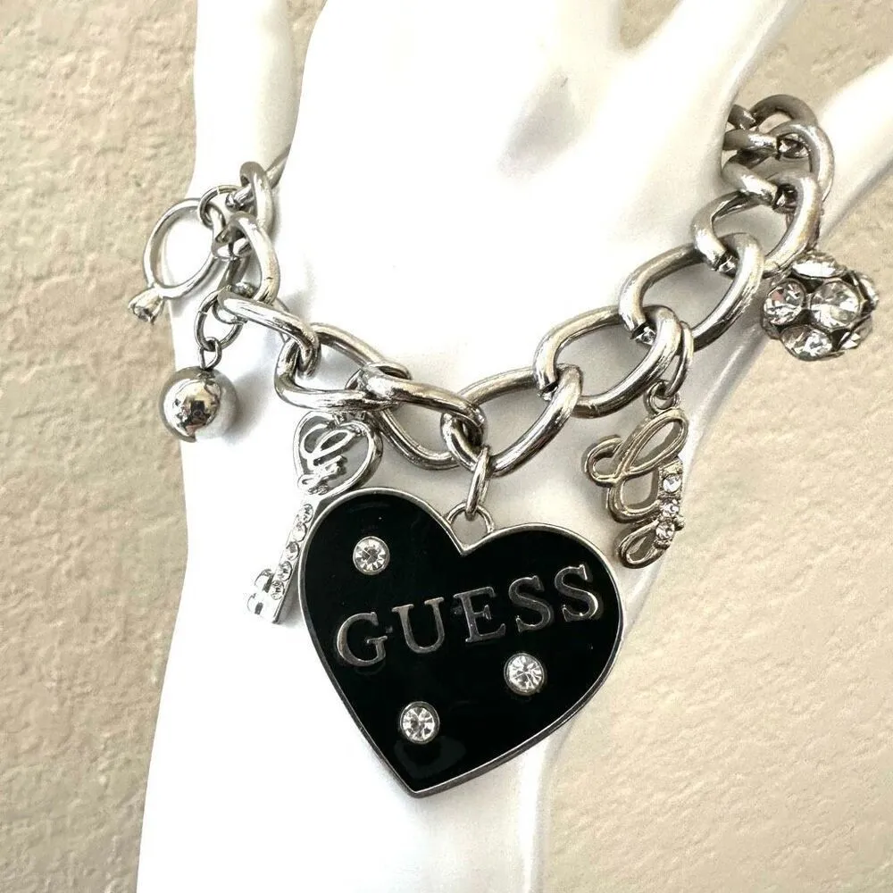 GUESS SILVER TONE CHAIN BLACK HEART CRYSTAL LOGO LOCK & KEY CHARM BRACELET - Image 2