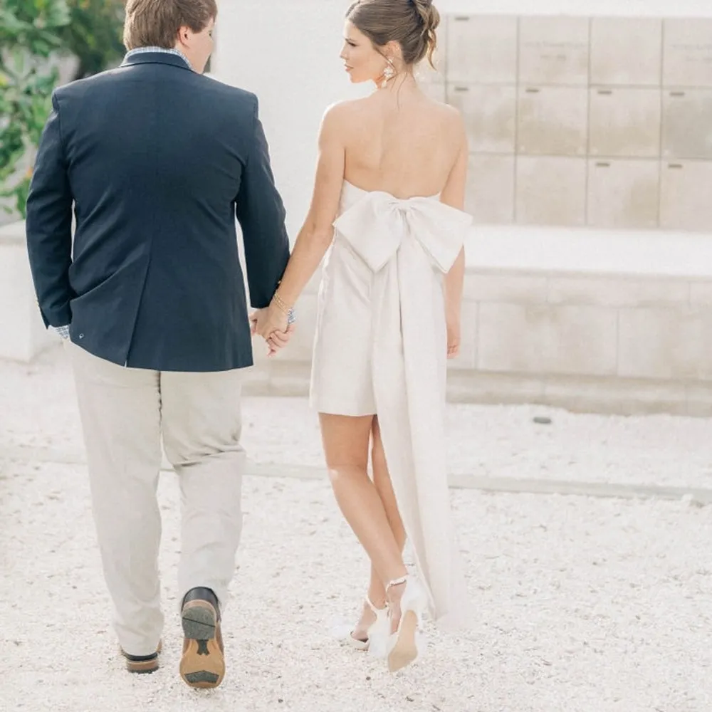 Dessy Group STRAPLESS SATIN COLUMN MINI DRESS WITH OVERSIZED BOW IN IVORY White Size 2 - Image 4