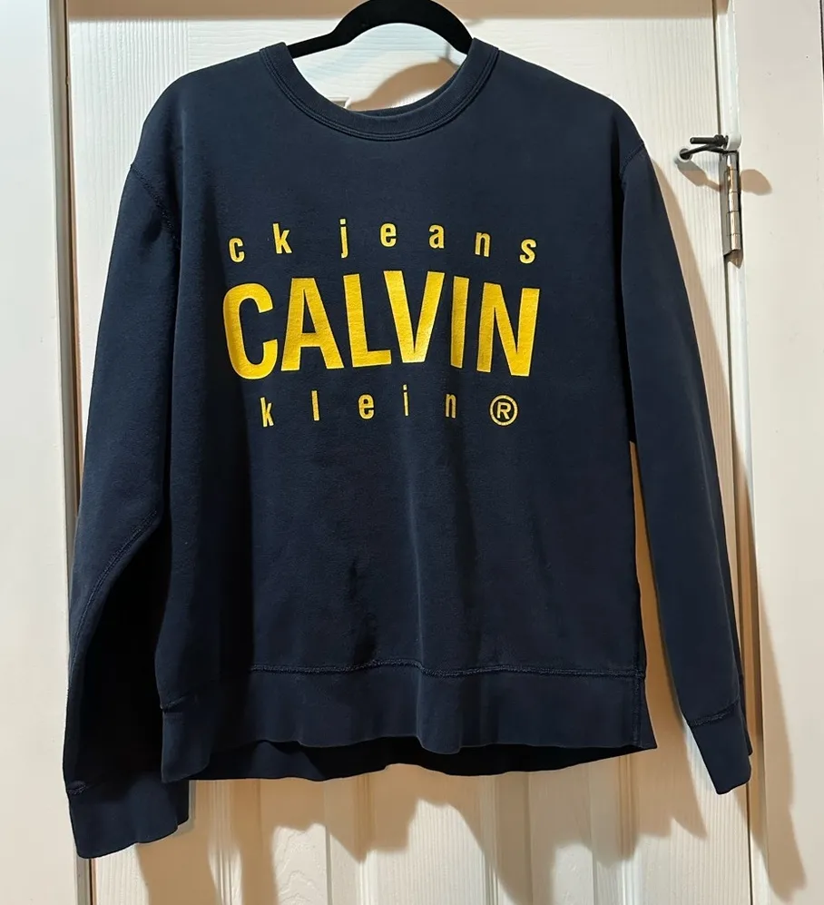 Calvin Klein Jeans Blue Boxy Sweatshirt with Yellow Logo - Image 1