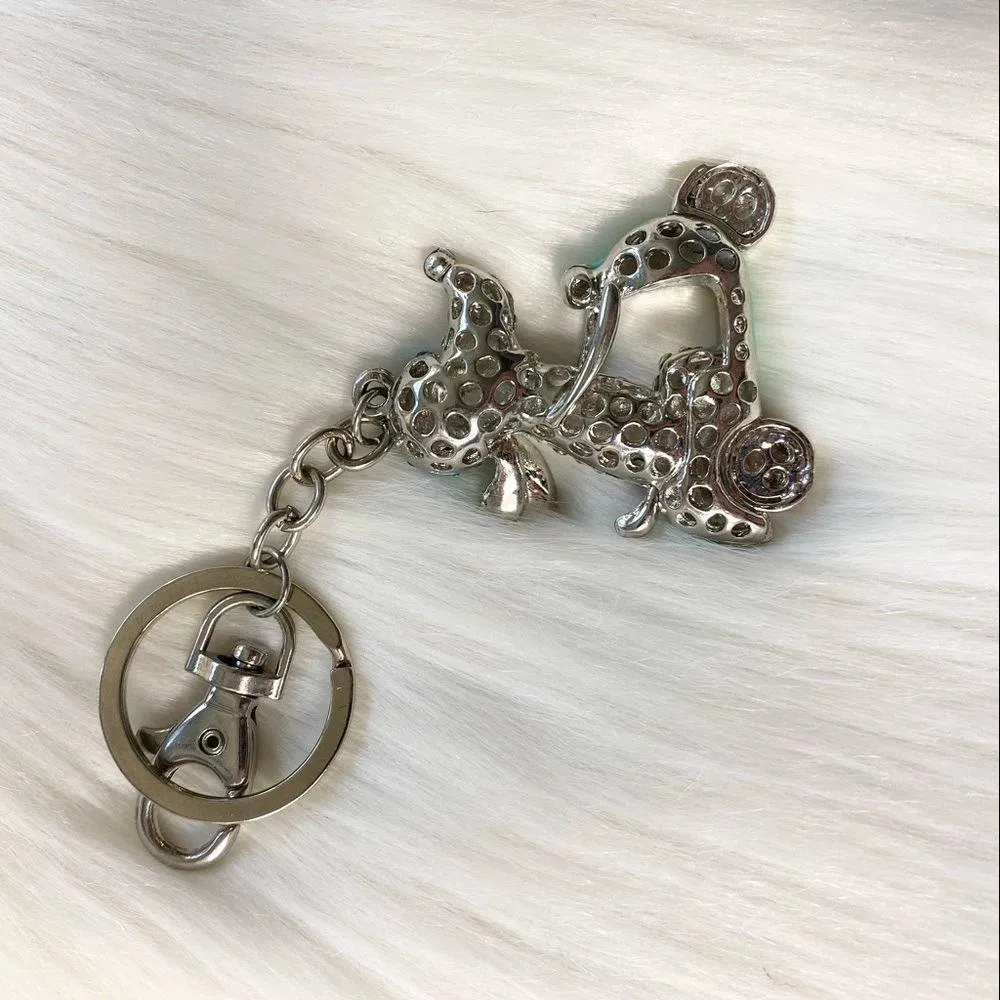 Rhinestone Dog Riding Turquoise Scooter Keychain - Image 2