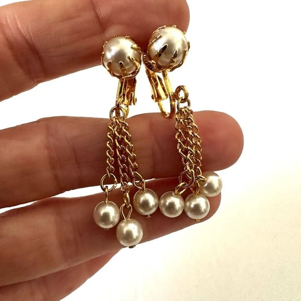 Gold tone faux pearl chain drop clip on earrings - Image 2